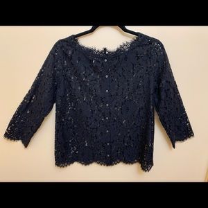 Black lace top. Button down the back. Like new!